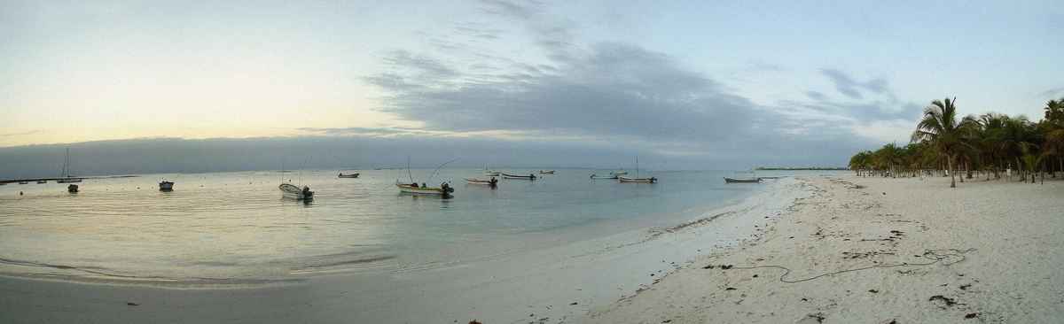Panoramic view of Akumal Bay with white sand, turquoise water and the reef line beyond, Riviera Maya, Mexico